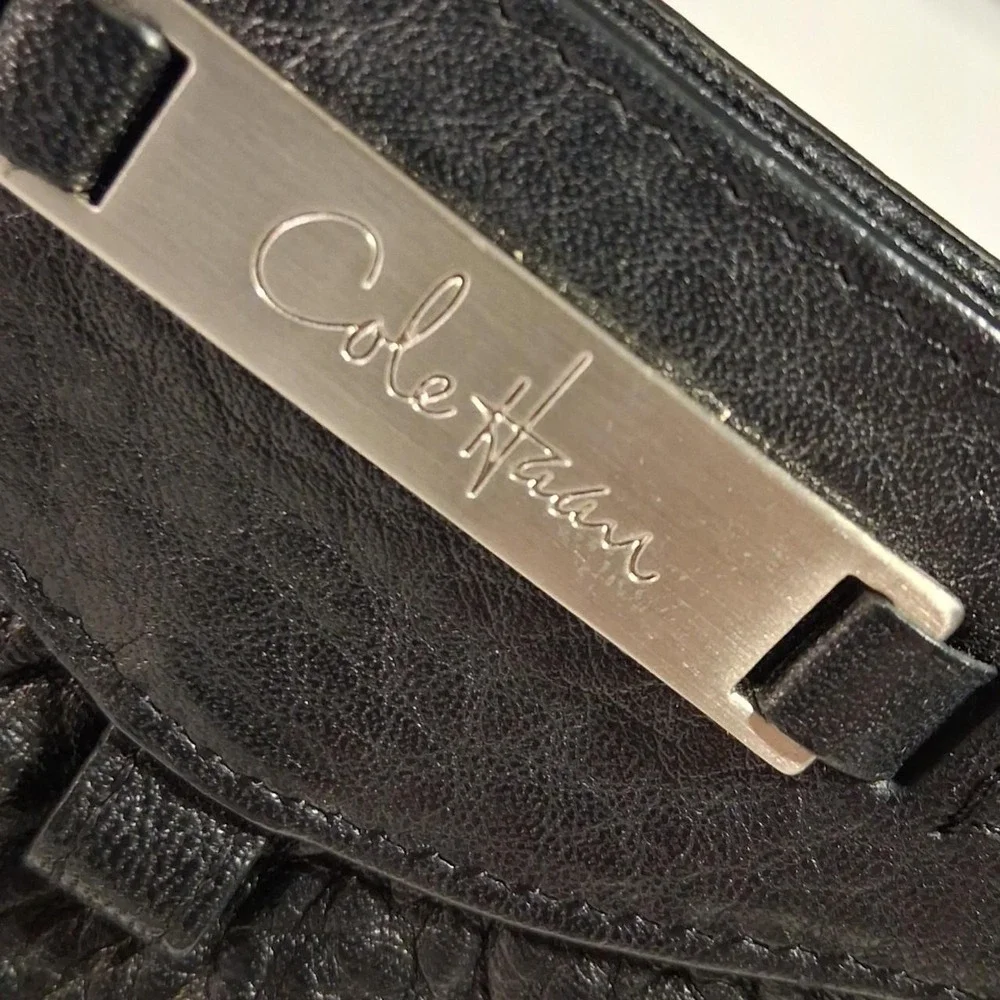 Womens Black leather clutch with textured pebbled finish great for make up